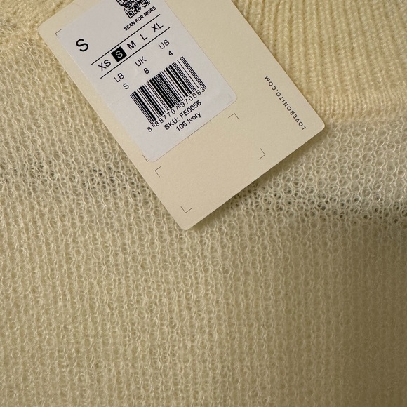 Ivory sweater. - Picture 2 of 2